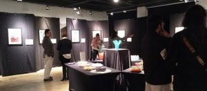 Visitors browse art at Southern Methodist University.