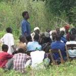 Villagers in Kenya attend a meeting to start a local savings program.