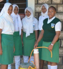 The Matuga girls with their biogas digester