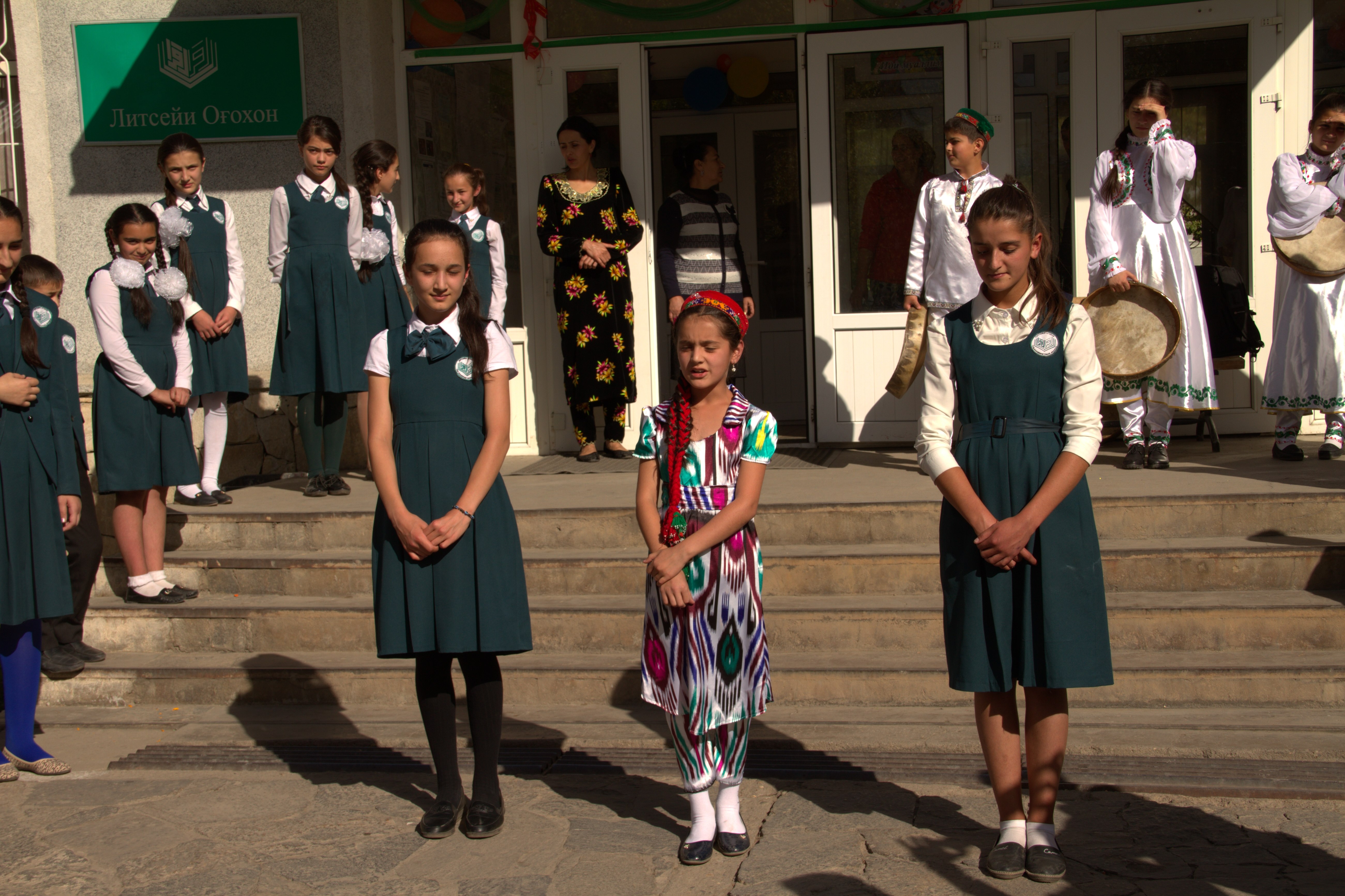 School children greet guests at the Aga Khan Lycee in Khorog, Tajikistan, with traditional Pamiri dance and song, as well as a poetry recitation in Tajiki/Farsi and English. The Lycee provides the best quality education to this isolated part of the world. Though the Lycee charges fees, many students who can prove need are subsidized. (Photo: Dilafruz Khonikboyeva/AKDN)