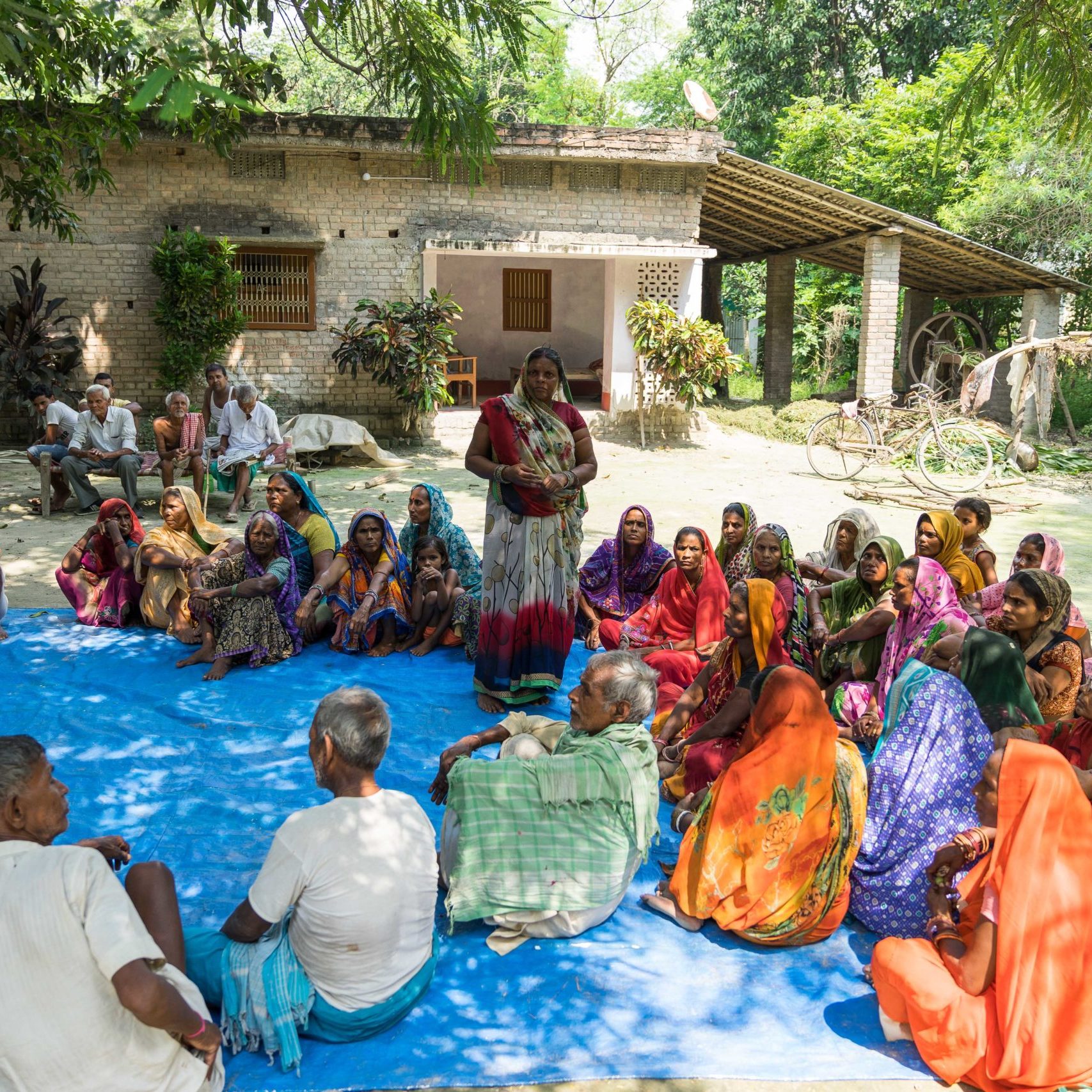 Members of a village drinking water supply scheme at a meeting -