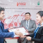 Asel Baidyldaeva receiving her award.