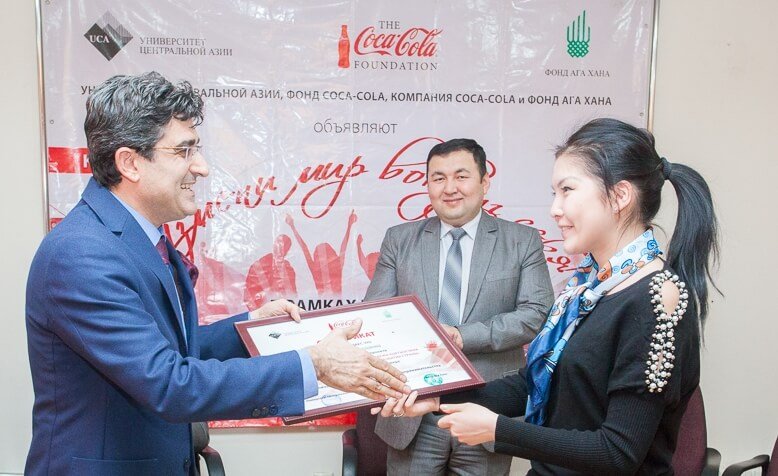 Asel Baidyldaeva receiving her award.
