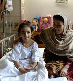 A patient and her mother at Aga Khan University Hospital. Aga Khan Foundation’s impact investing program has attracted investments from U.S.-based partners such as the Overseas Private Investment Corporation (OPIC) for social enterprises like the Aga Khan University’s hospital expansion.