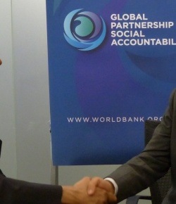Representing the World Bank Group, Mr. Sanjay Pradhan, Vice President for Change, Knowledge and Learning, shakes hands with Dr. Mirza Jahani, CEO of Aga Khan Foundation U.S.A