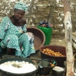Woman selling produce in Mali