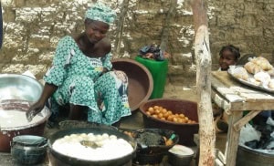 Woman selling produce in Mali