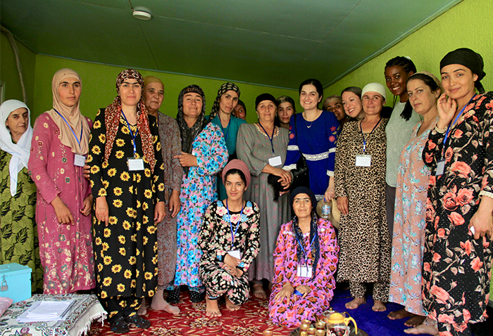 Members of a community-based savings group in Tajikistan gather to increase their financial access and power.