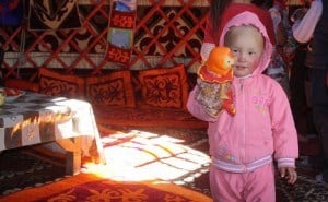 child playing in a yurt kindergarten