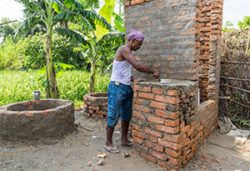 Audesh Kumar building a new toilet in a village, Muzaffarpur, Bihar. AKDN/Christopher Wilton-Steer
